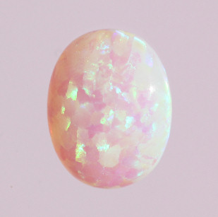 Lab Created Opal:  Oval Cabochon White Purple (k-17A) Lab Created Opal