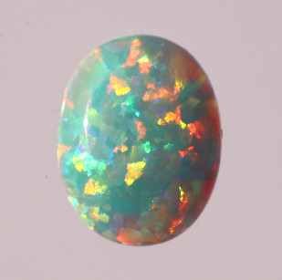 Lab Created Opal:  Oval Cabochon L. Turquoise (k-50) Lab Created Opal