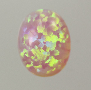 Lab Created Opal:  Oval Cabochon Light Pink (k-8) Lab Created Opal