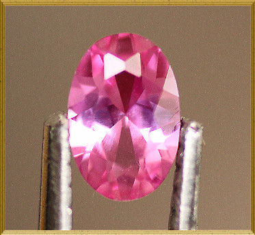 Lab Created Ruby:  Pink Oval Lab Created Ruby